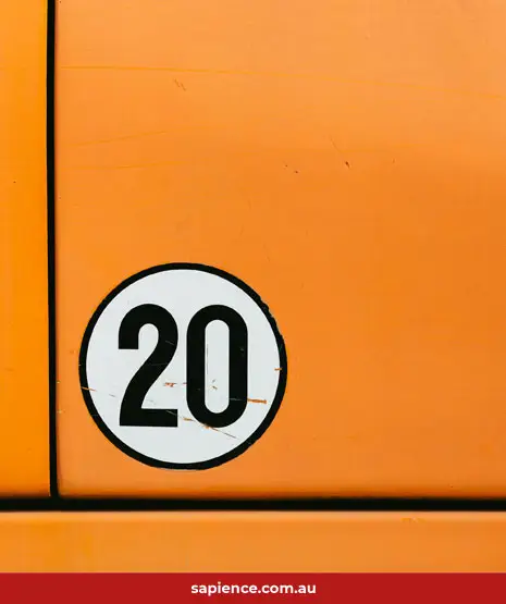 the number 20 on an orange car door