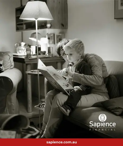 grandmother reading to grandson