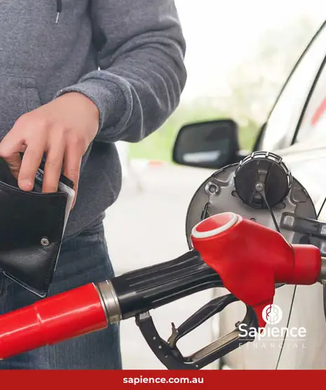 person standing at petrol bowser